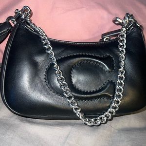 New black coach bag never worn!